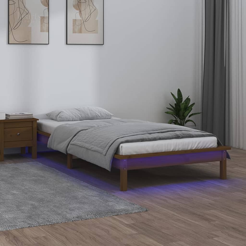 sengeramme med LED-lys 100x200 cm massivt træ gyldenbrun