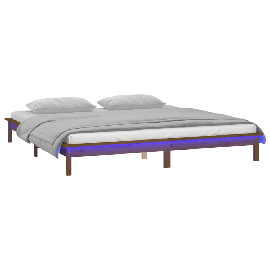 sengeramme med LED-lys 140x200 cm massivt træ gyldenbrun