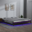 sengeramme med LED-lys 140x200 cm massivt træ gyldenbrun