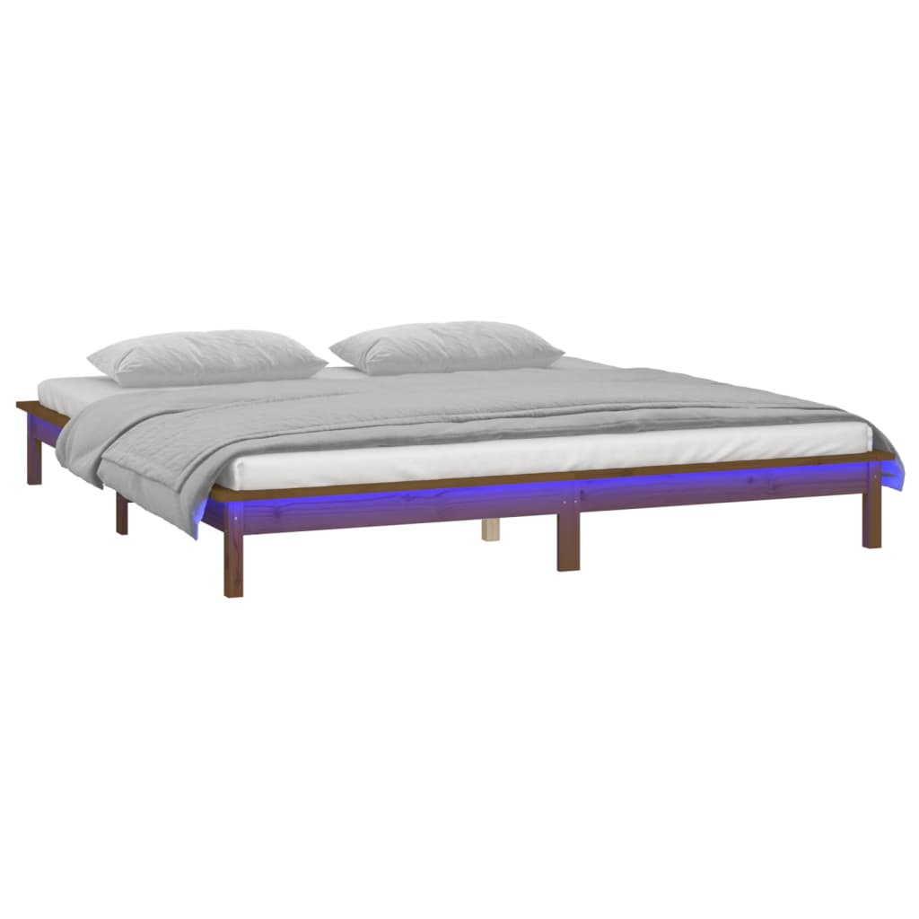 sengeramme med LED-lys 120x190 cm massivt træ gyldenbrun