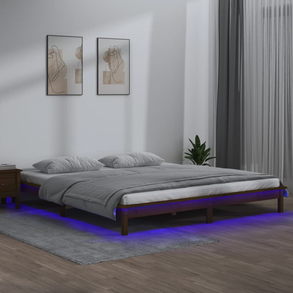sengeramme med LED-lys 140x190 cm massivt træ gyldenbrun