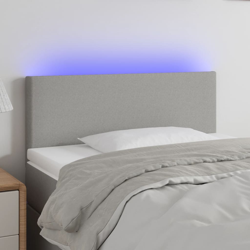 sengegavl med LED-lys 90x5x78/88 cm stof lysegrå