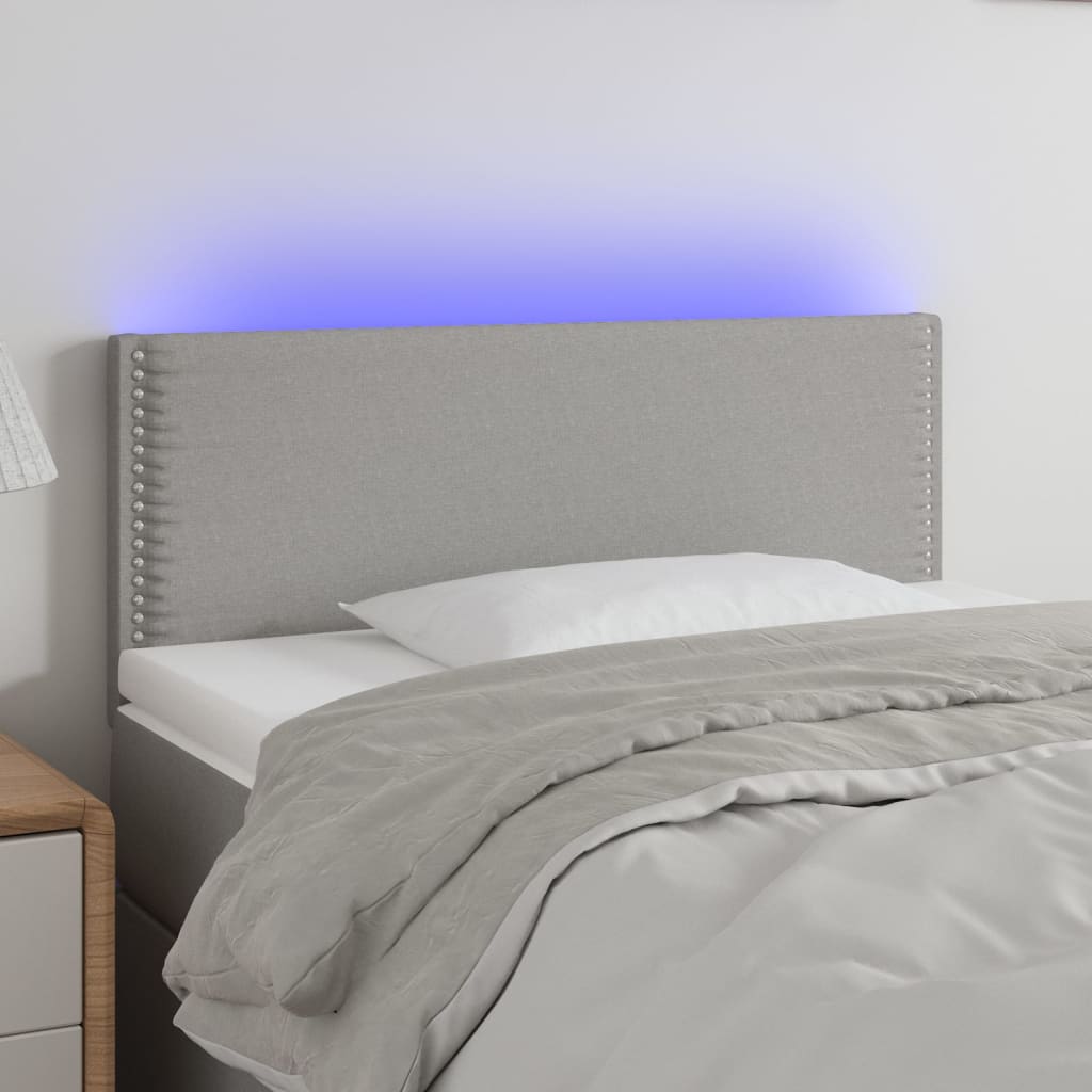 sengegavl med LED-lys 80x5x78/88 cm stof lysegrå