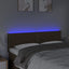 sengegavl med LED-lys 144x5x78/88 cm stof mørkebrun