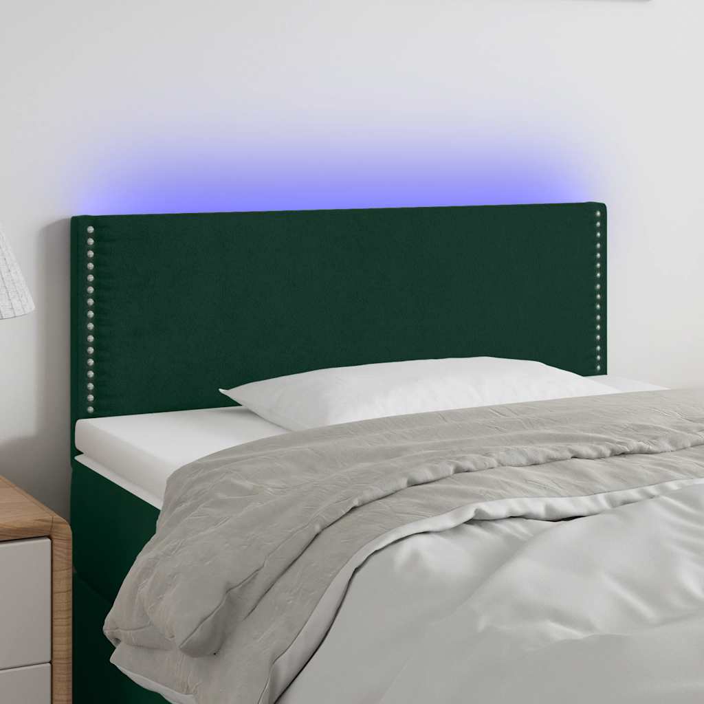 sengegavl med LED-lys 100x5x78/88 cm fløjl mørkegrøn