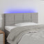 sengegavl med LED-lys 80x5x78/88 cm stof lysegrå