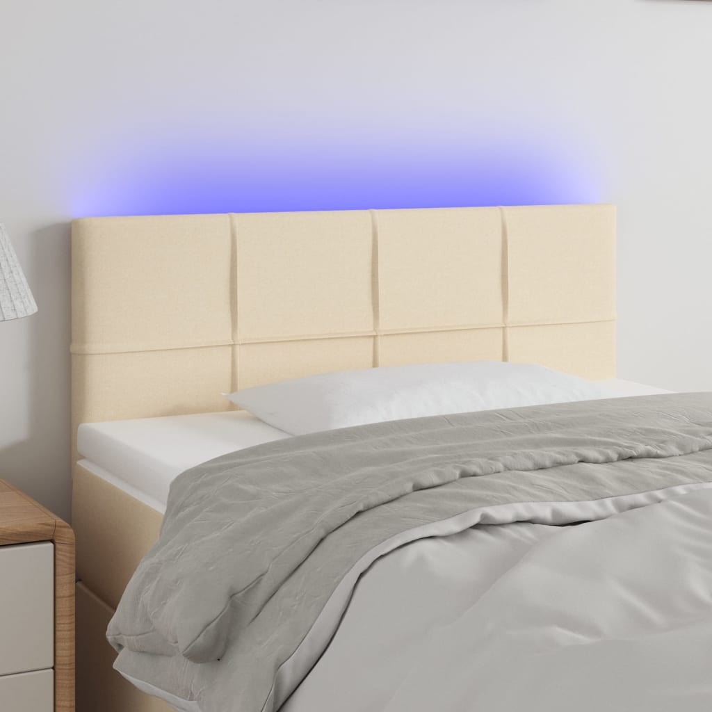 sengegavl med LED-lys 80x5x78/88 cm stof cremefarvet