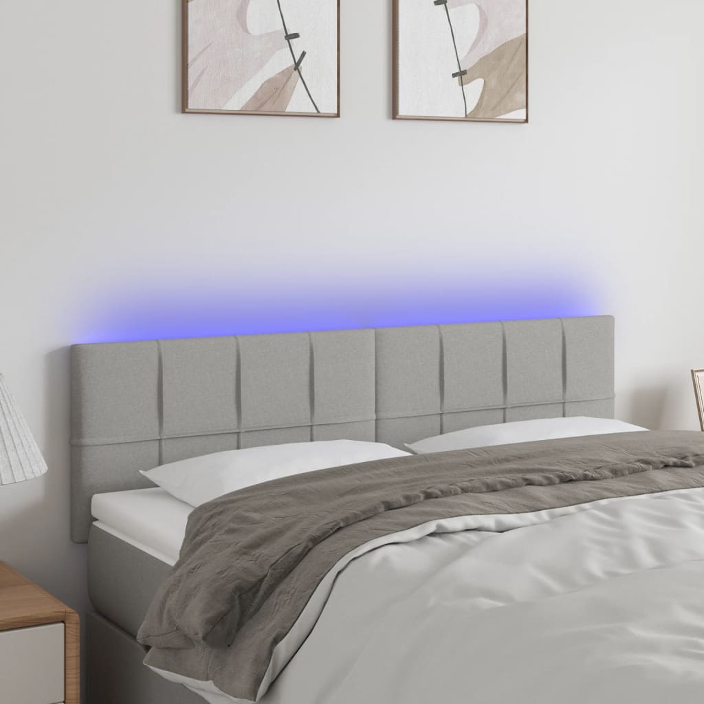 sengegavl med LED-lys 144x5x78/88 cm stof lysegrå