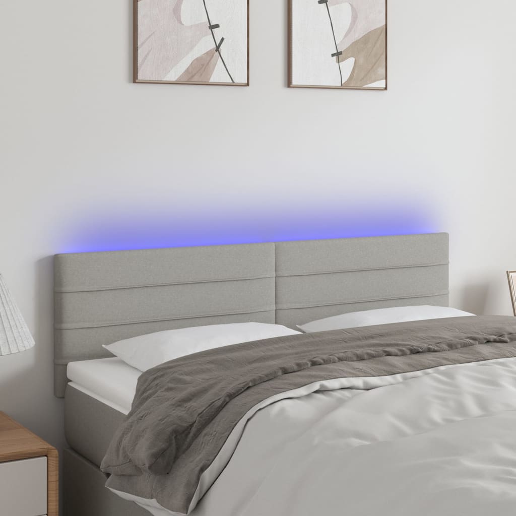 sengegavl med LED-lys 144x5x78/88 cm stof lysegrå