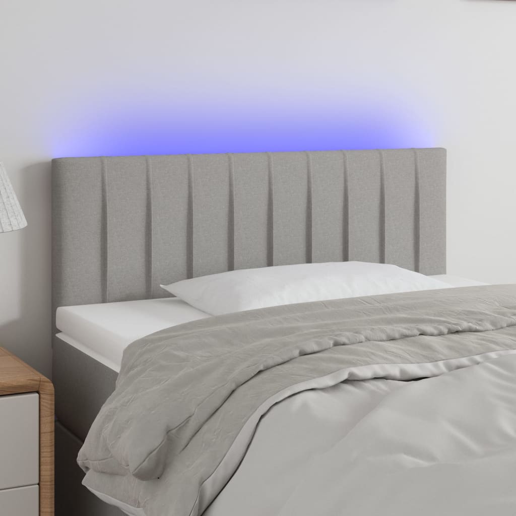 sengegavl med LED-lys 80x5x78/88 cm stof lysegrå