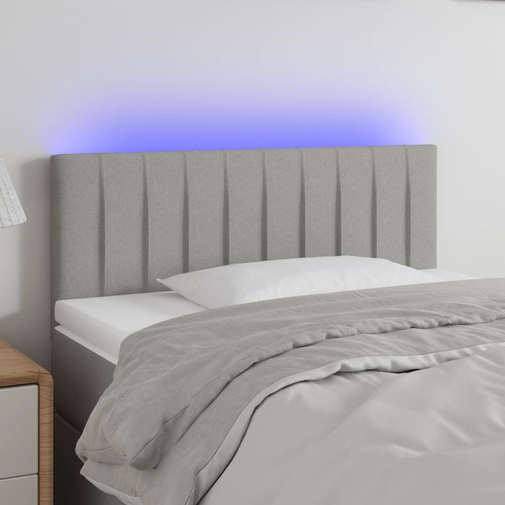 sengegavl med LED-lys 100x5x78/88 cm stof lysegrå
