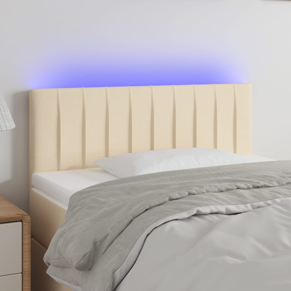 sengegavl med LED-lys 100x5x78/88 cm stof cremefarvet