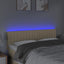 sengegavl med LED-lys 144x5x78/88 cm stof cremefarvet