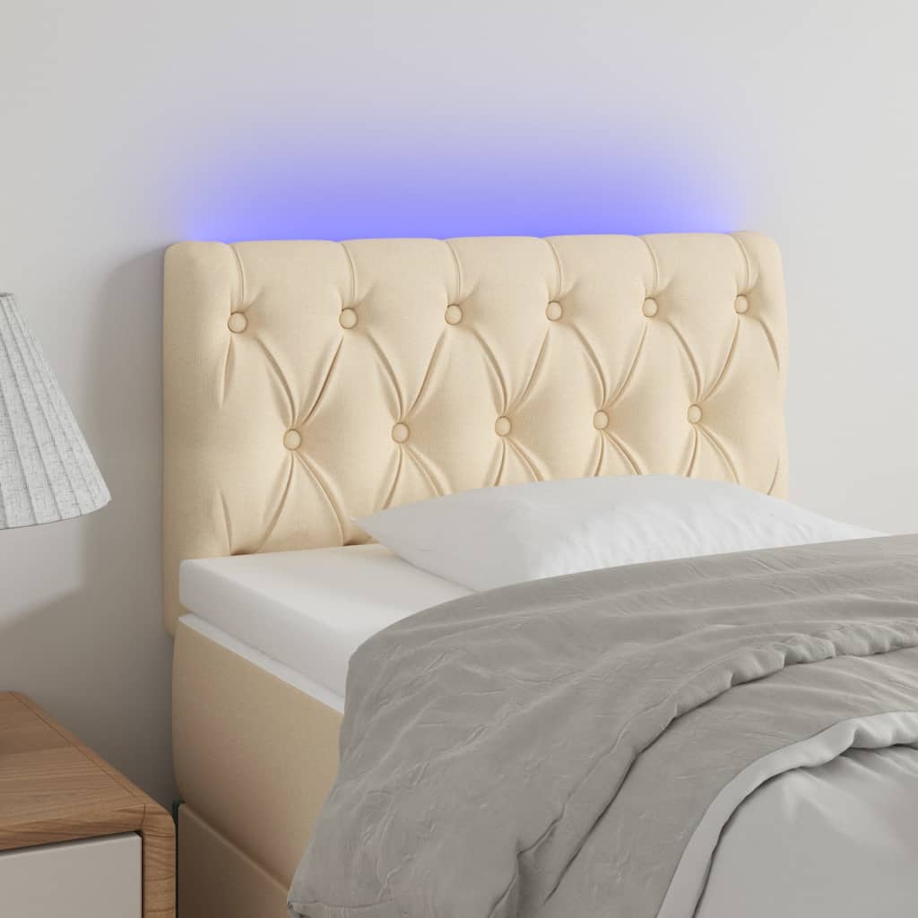 sengegavl med LED-lys 80x7x78/88 cm stof cremefarvet