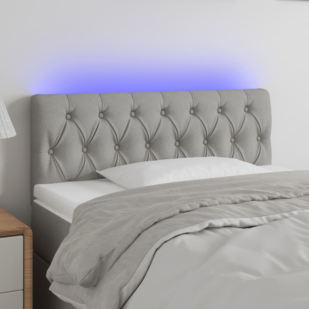 sengegavl med LED-lys 90x7x78/88 cm stof lysegrå