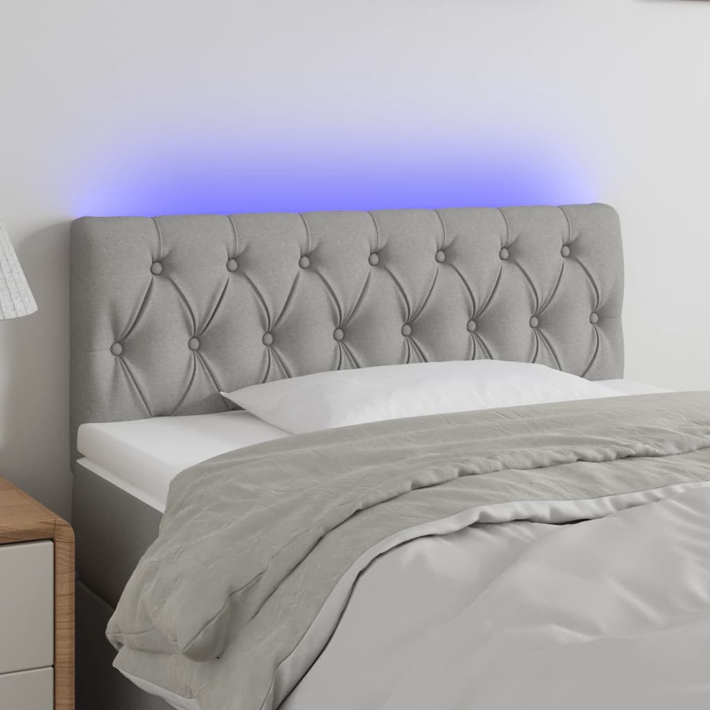 sengegavl med LED-lys 100x7x78/88 cm stof lysegrå