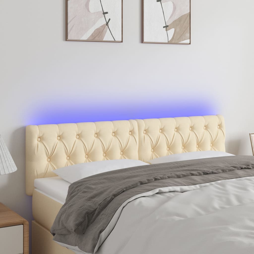 sengegavl med LED-lys 160x7x78/88 cm stof cremefarvet