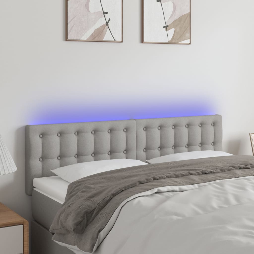 sengegavl med LED-lys 144x5x78/88 cm stof lysegrå