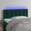 sengegavl med LED-lys 100x5x78/88 cm fløjl mørkegrøn
