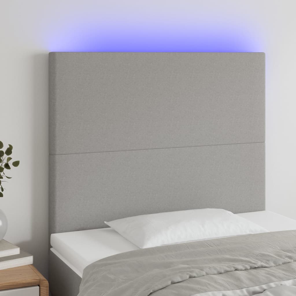 sengegavl med LED-lys 100x5x118/128 cm stof lysegrå