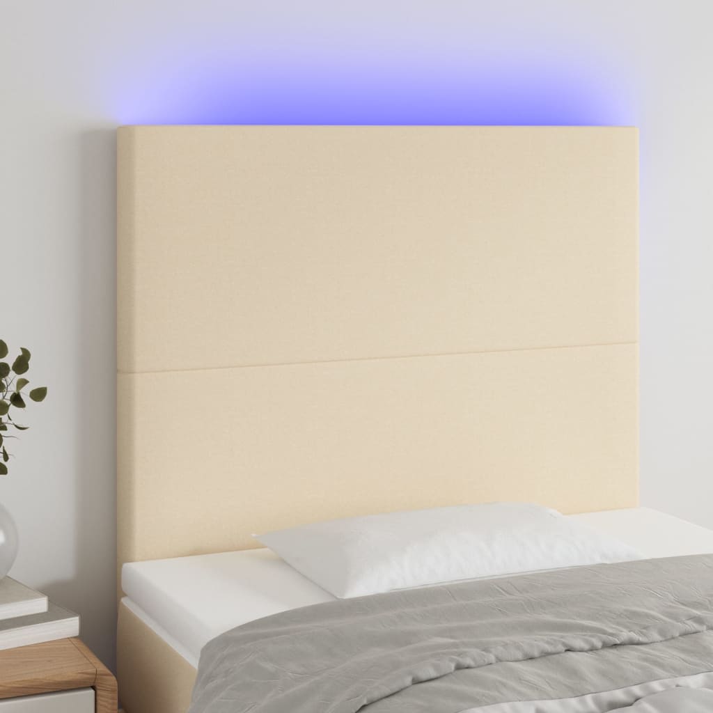 sengegavl med LED-lys 100x5x118/128 cm stof cremefarvet