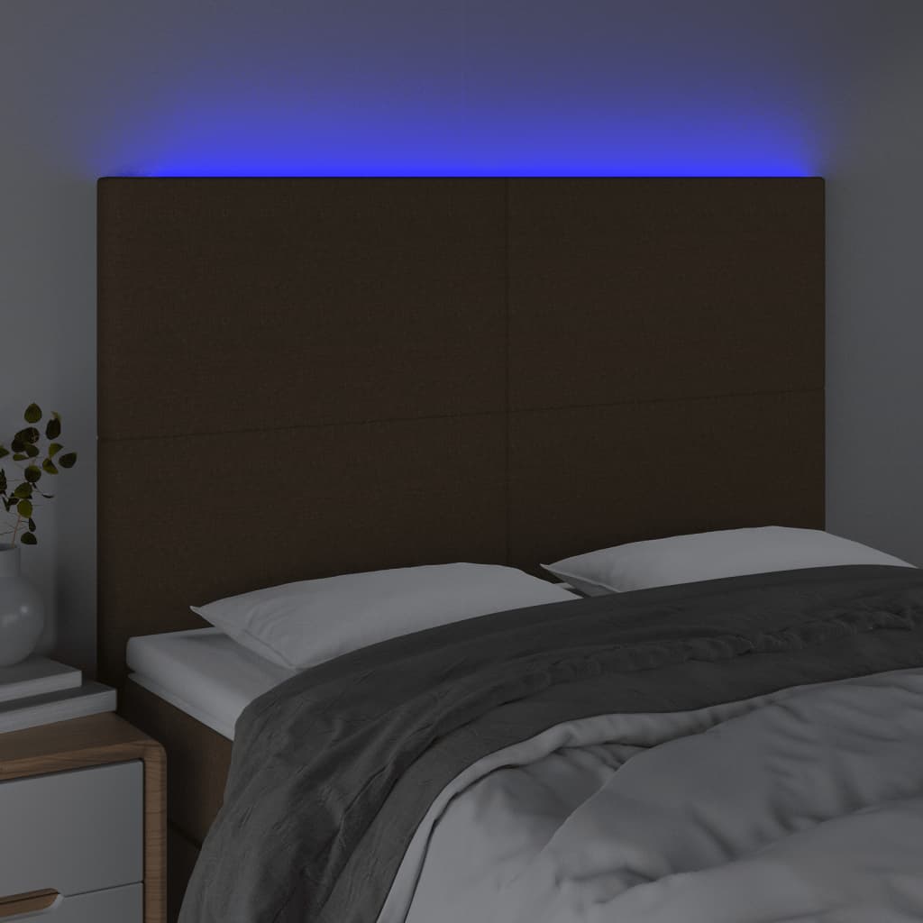 sengegavl med LED-lys 144x5x118/128 cm stof mørkebrun