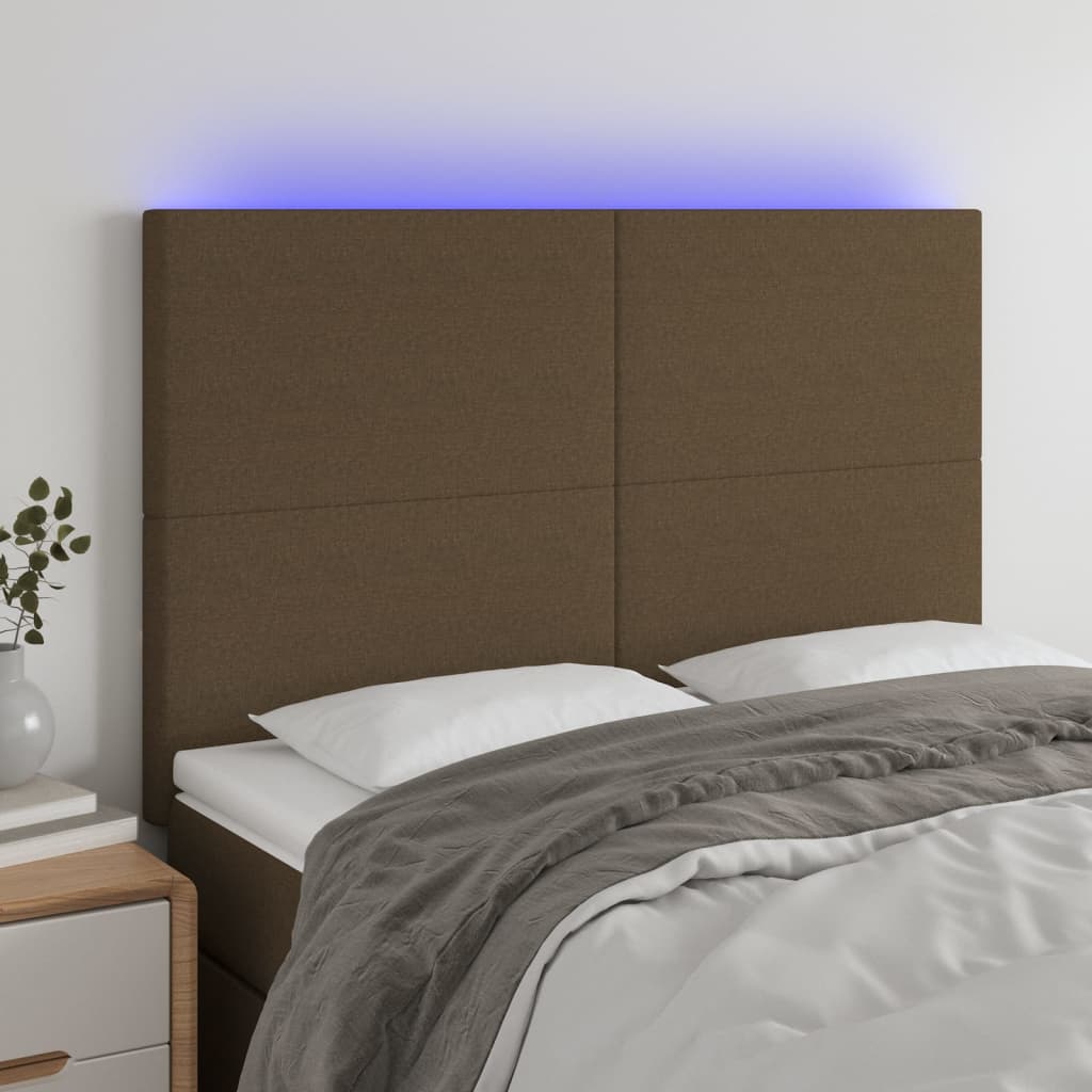 sengegavl med LED-lys 144x5x118/128 cm stof mørkebrun