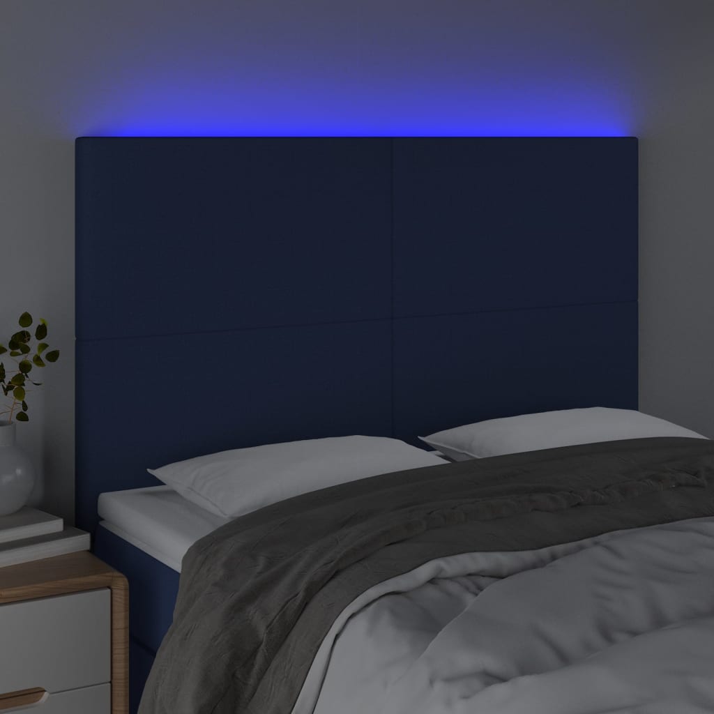 sengegavl med LED-lys 144x5x118/128 cm stof blå