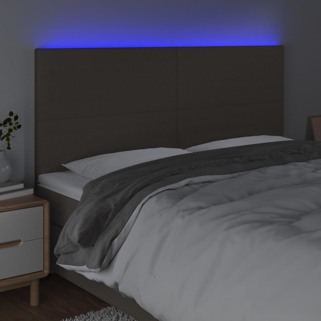 sengegavl med LED-lys 180x5x118/128 cm stof gråbrun