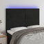 sengegavl med LED-lys 144x5x118/128 cm fløjl sort