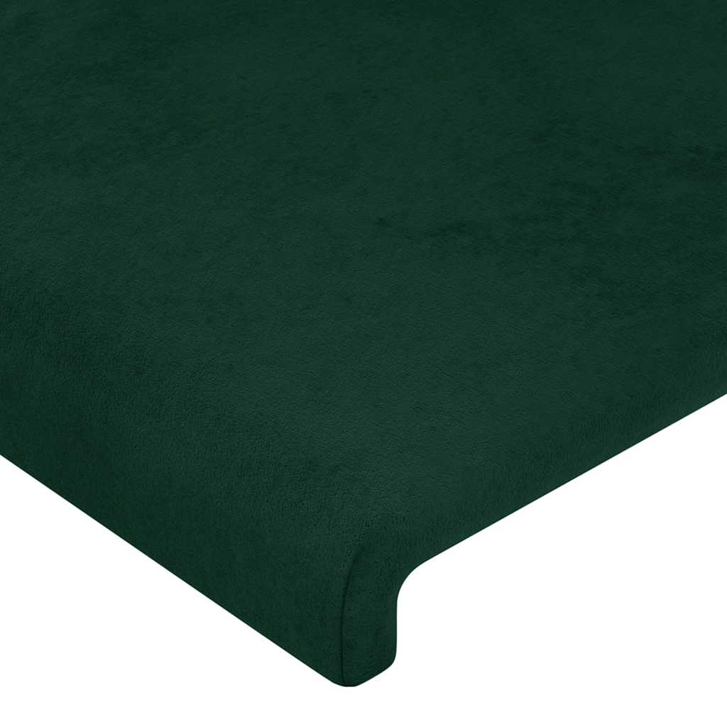 sengegavl med LED-lys 144x5x118/128 cm fløjl mørkegrøn