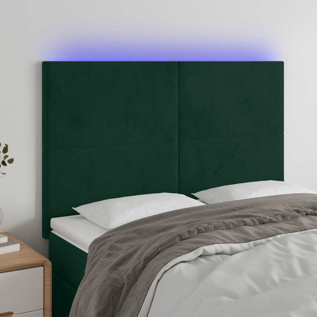 sengegavl med LED-lys 144x5x118/128 cm fløjl mørkegrøn
