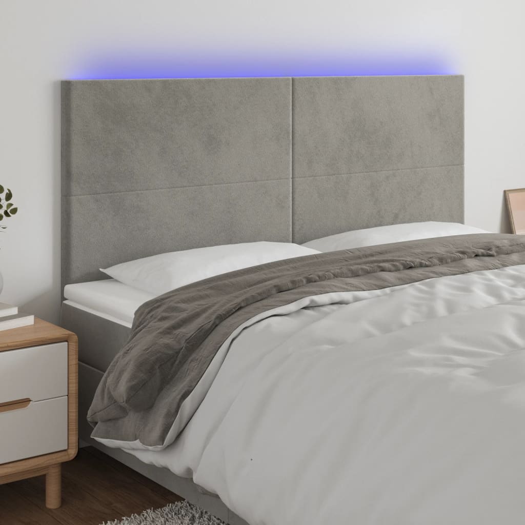 sengegavl med LED-lys 160x5x118/128 cm fløjl lysegrå