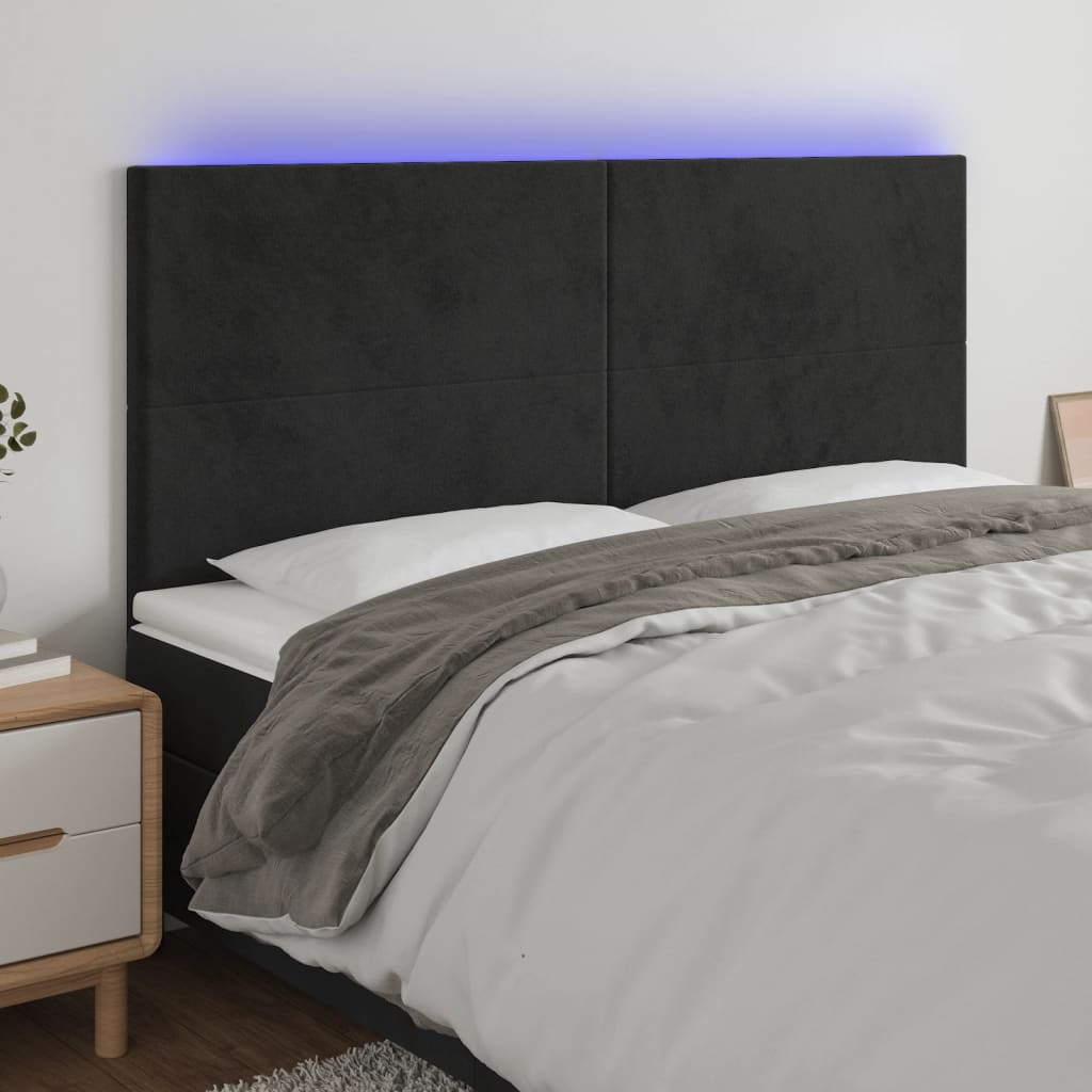 sengegavl med LED-lys 160x5x118/128 cm fløjl sort
