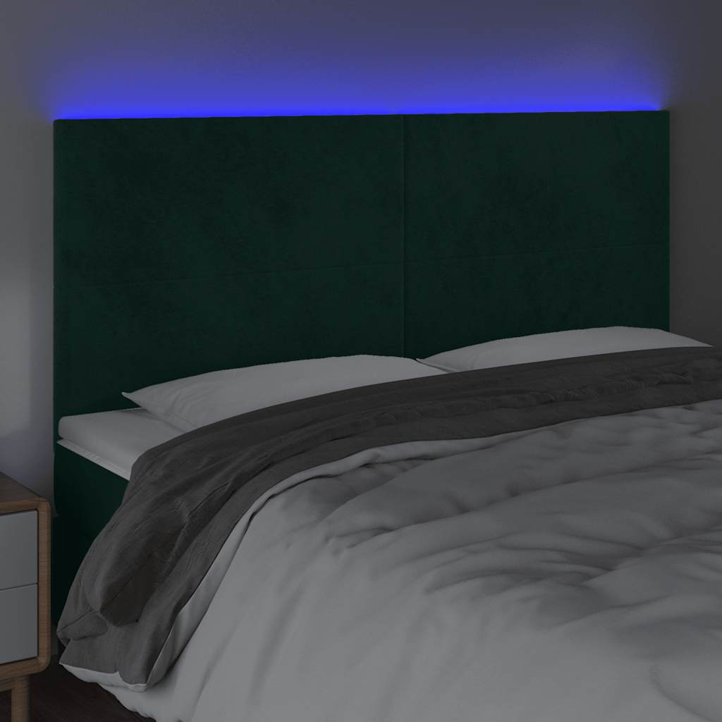 sengegavl med LED-lys 160x5x118/128 cm fløjl mørkegrøn