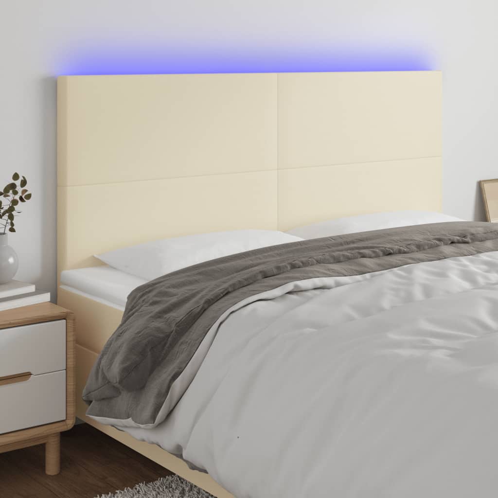 sengegavl med LED-lys 180x5x118/128 cm kunstlæder cremefarvet