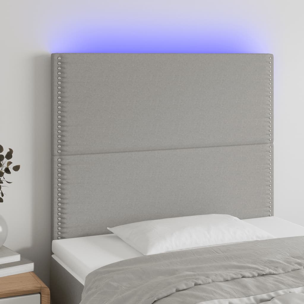 sengegavl med LED-lys 90x5x118/128 cm stof lysegrå