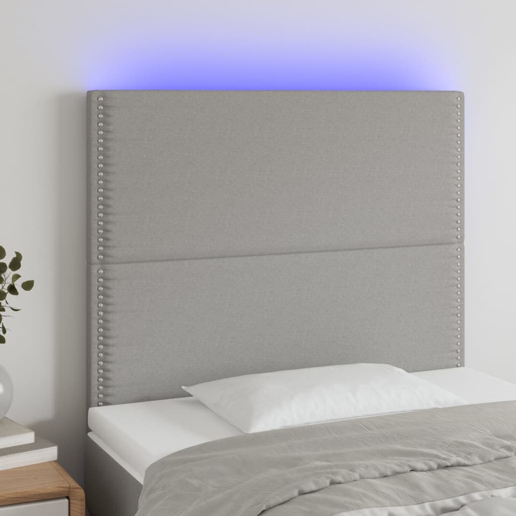 sengegavl med LED-lys 100x5x118/128 cm stof lysegrå