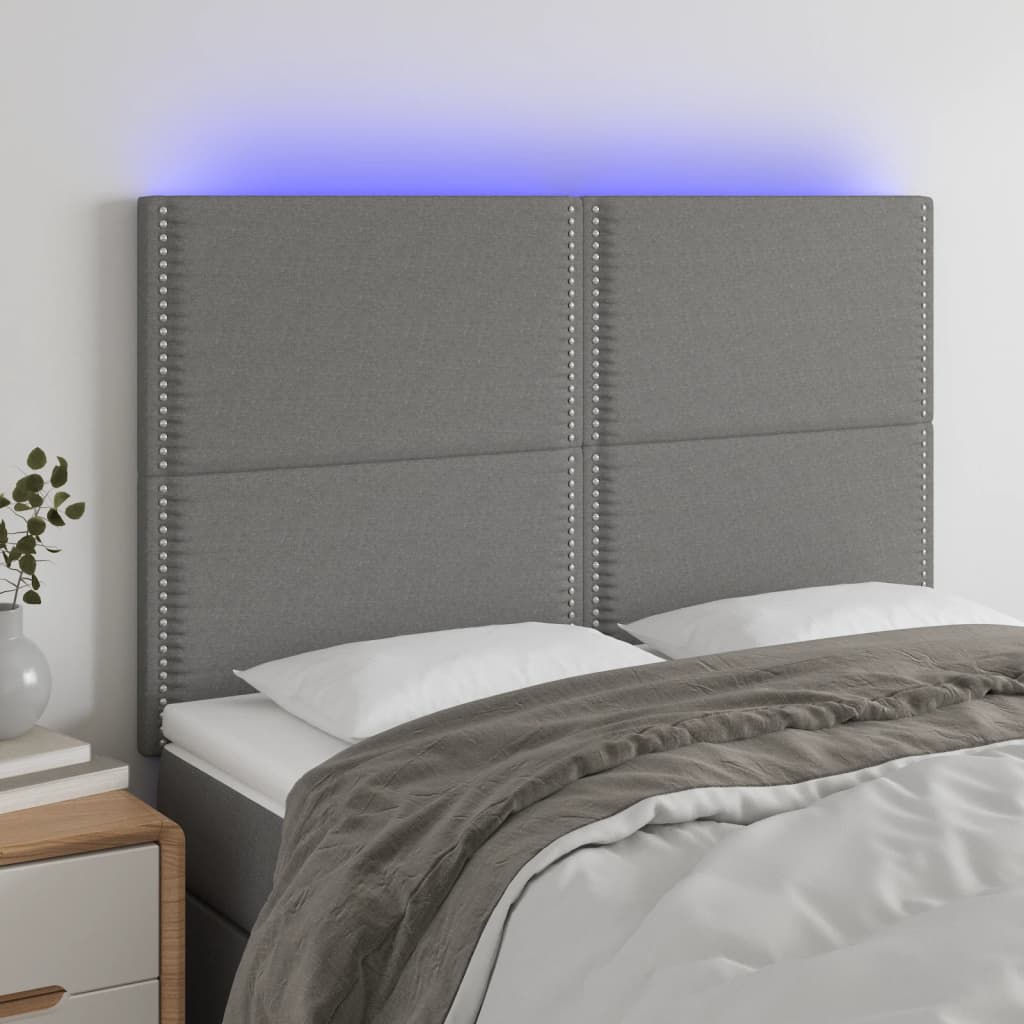 sengegavl med LED-lys 144x5x118/128 cm stof mørkegrå