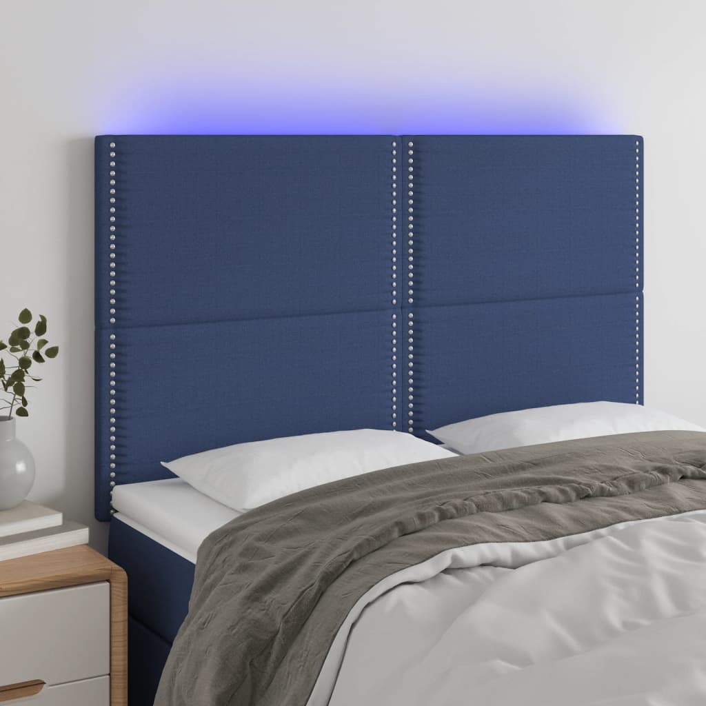 sengegavl med LED-lys 144x5x118/128 cm stof blå