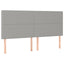 sengegavl med LED-lys 180x5x118/128 cm stof lysegrå