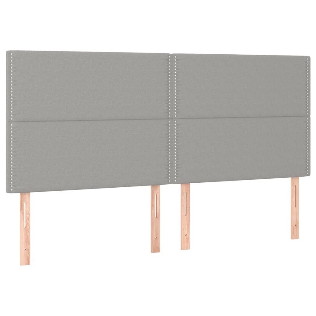sengegavl med LED-lys 180x5x118/128 cm stof lysegrå