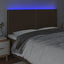 sengegavl med LED-lys 180x5x118/128 cm stof mørkebrun