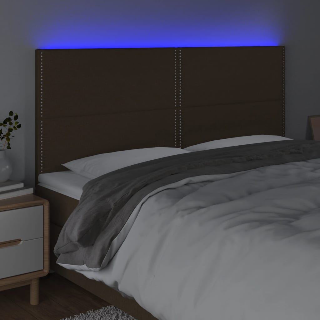 sengegavl med LED-lys 180x5x118/128 cm stof mørkebrun