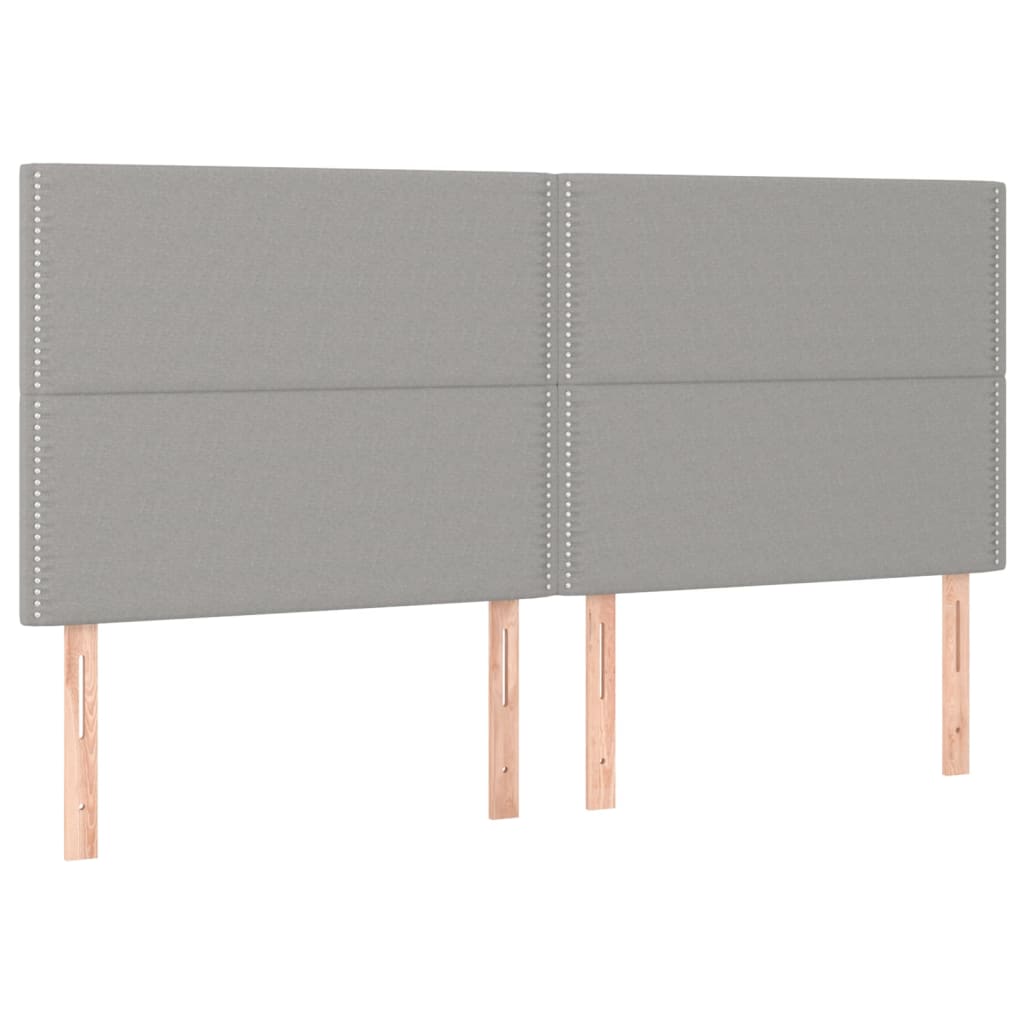 sengegavl med LED-lys 200x5x118/128 cm stof lysegrå