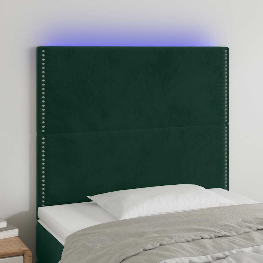 sengegavl med LED-lys 100x5x118/128 cm fløjl mørkegrøn