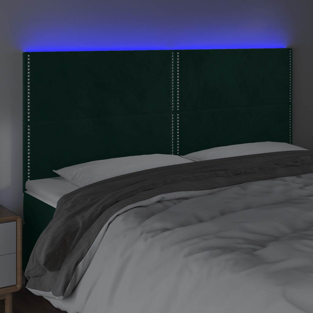 sengegavl med LED-lys 180x5x118/128 cm fløjl mørkegrøn