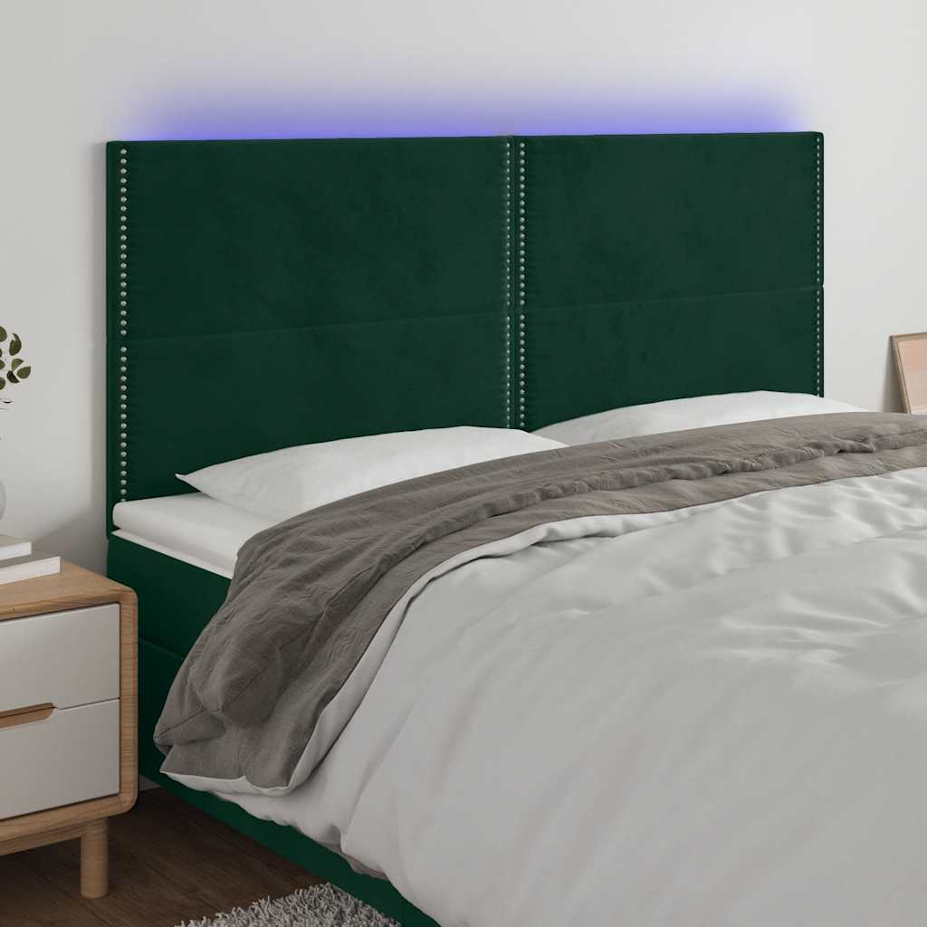 sengegavl med LED-lys 180x5x118/128 cm fløjl mørkegrøn