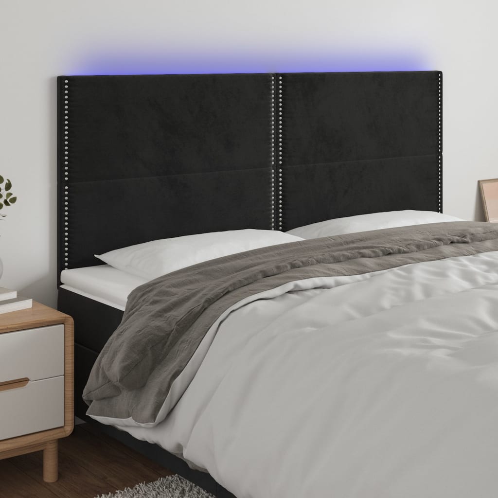 sengegavl med LED-lys 200x5x118/128 cm fløjl sort