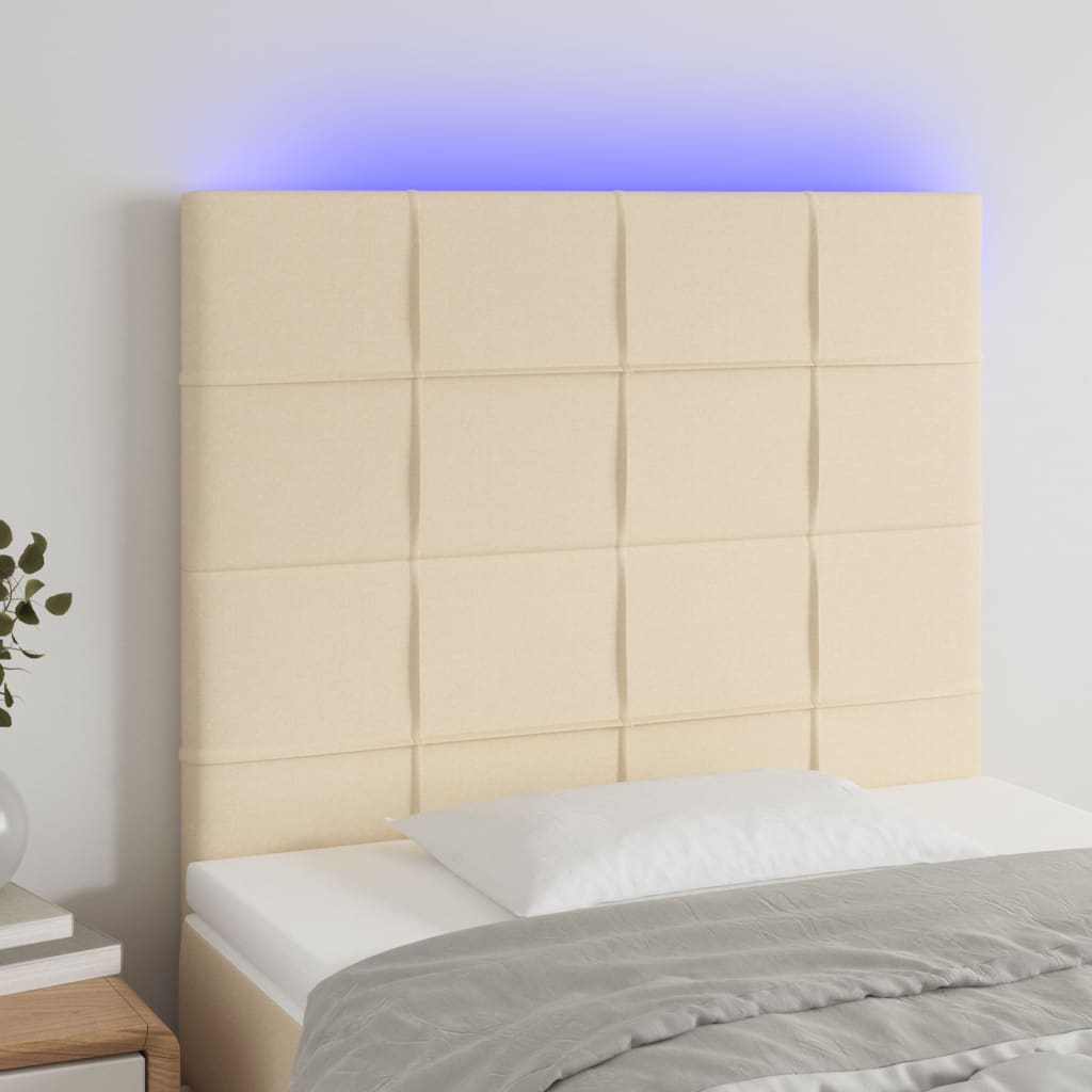 sengegavl med LED-lys 100x5x118/128 cm stof cremefarvet